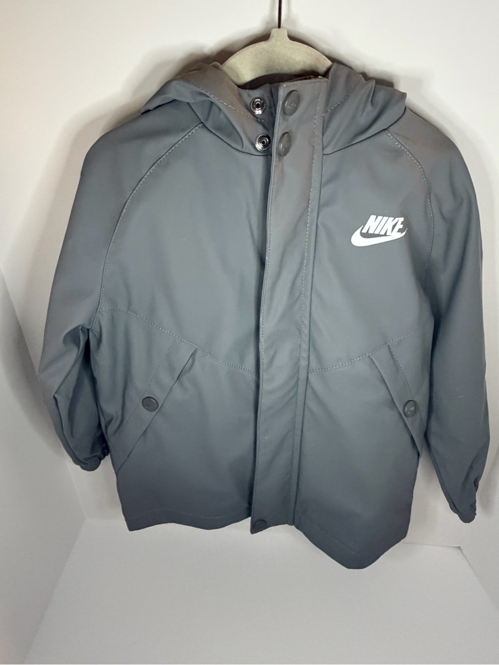 Nike Kids Hooded Rain Jacket in Gray with White Logo